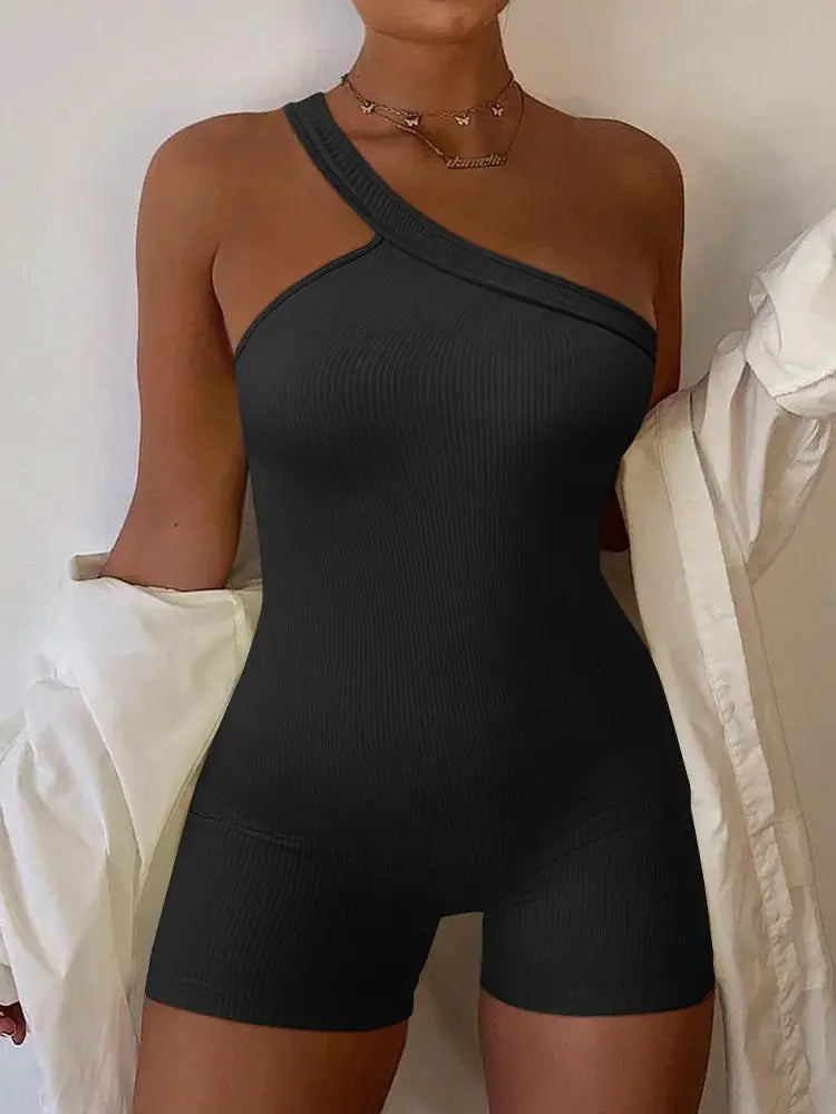 Simples Market ribbed black women's one-piece yoga romper with an asymmetric strap