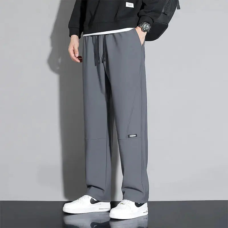 Simples Market 10XL casual men's jogger pants in grey with elastic waist and drawstring, loose straight leg.