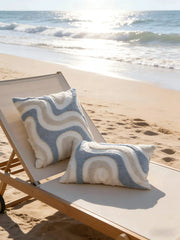 Two blue and white loop velvet pillowcases with irregular geometric pattern in Bohemian style