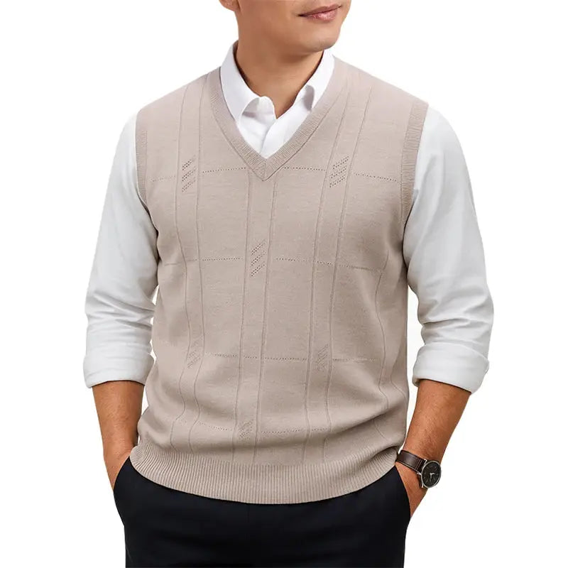 Men's beige lightweight V-neck sleeveless sweater vest with twist knit pattern worn over a white dress shirt