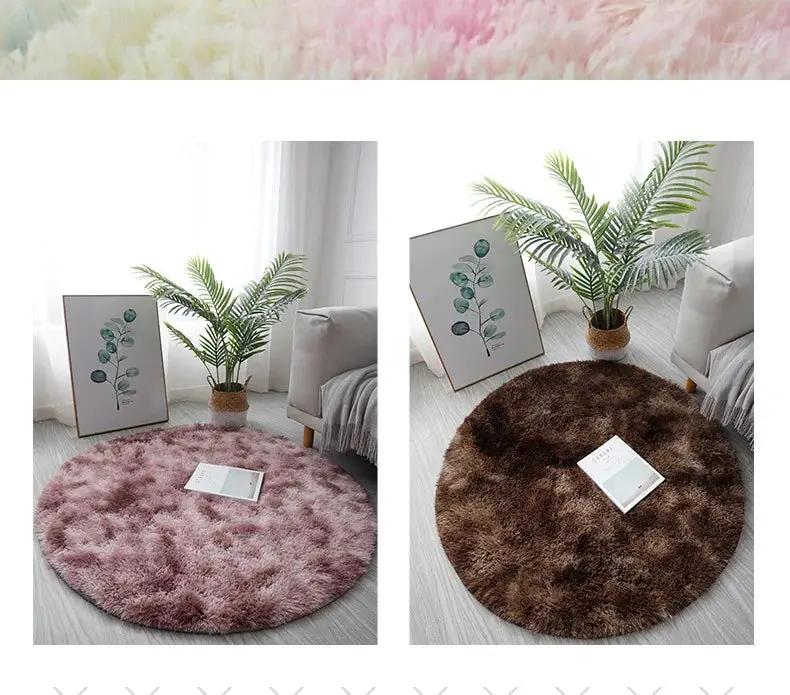 Two round plush rugs in pink and brown with thick pile on living room floor beside a plant and framed art