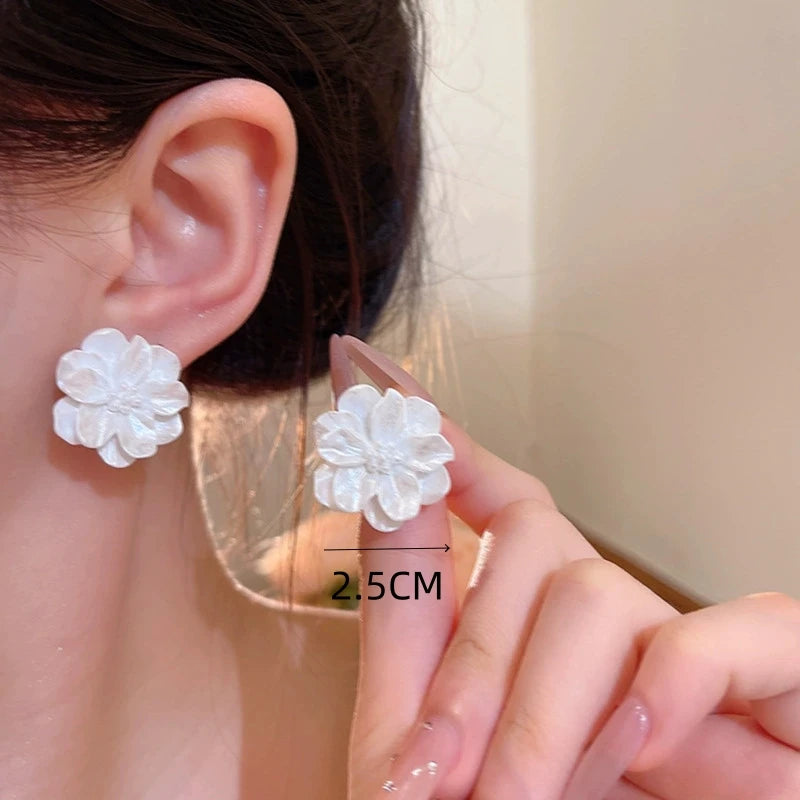 Pair of white camellia flower stud earrings for women, 2.5 cm diameter, fashion Korean-style jewelry