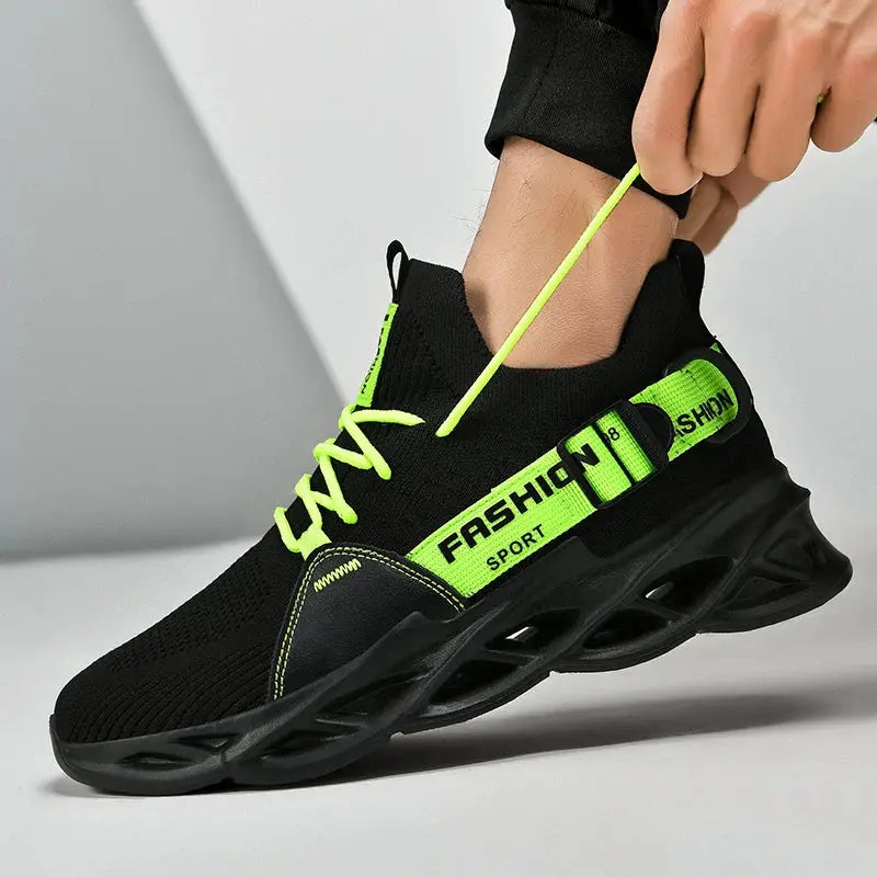 Sneakers with black breathable mesh, neon green laces and heel strap, thick sculpted sole