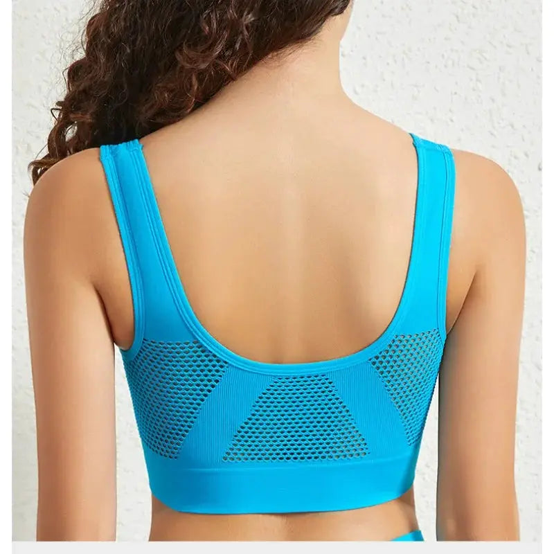 Plus size seamless breathable mesh sports bra in blue with ribbed band and back mesh panels