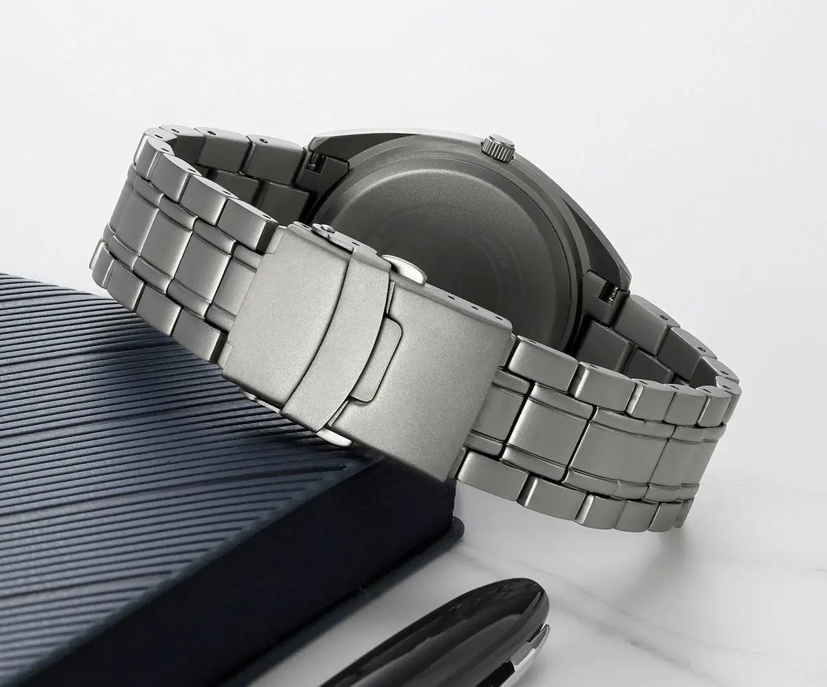 BERNY titanium men's wristwatch with a silver metal link bracelet and deployment clasp