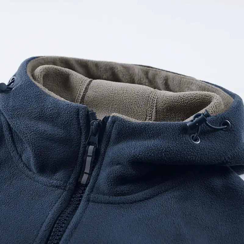 Men's navy fleece hooded jacket with beige inner lining, zip front and adjustable collar drawstrings.