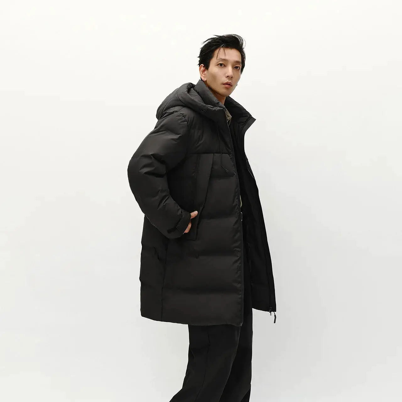Men's long black hooded down puffer jacket, loose fit for winter outerwear by Simples Market
