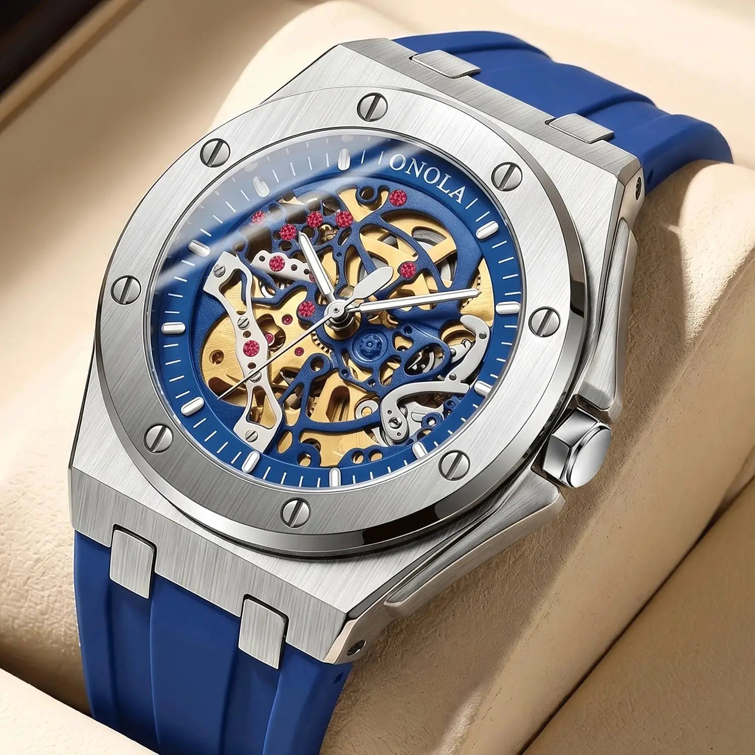 ONOLA skeleton luxury sports men's wristwatch with blue dial, visible gears, blue silicone strap