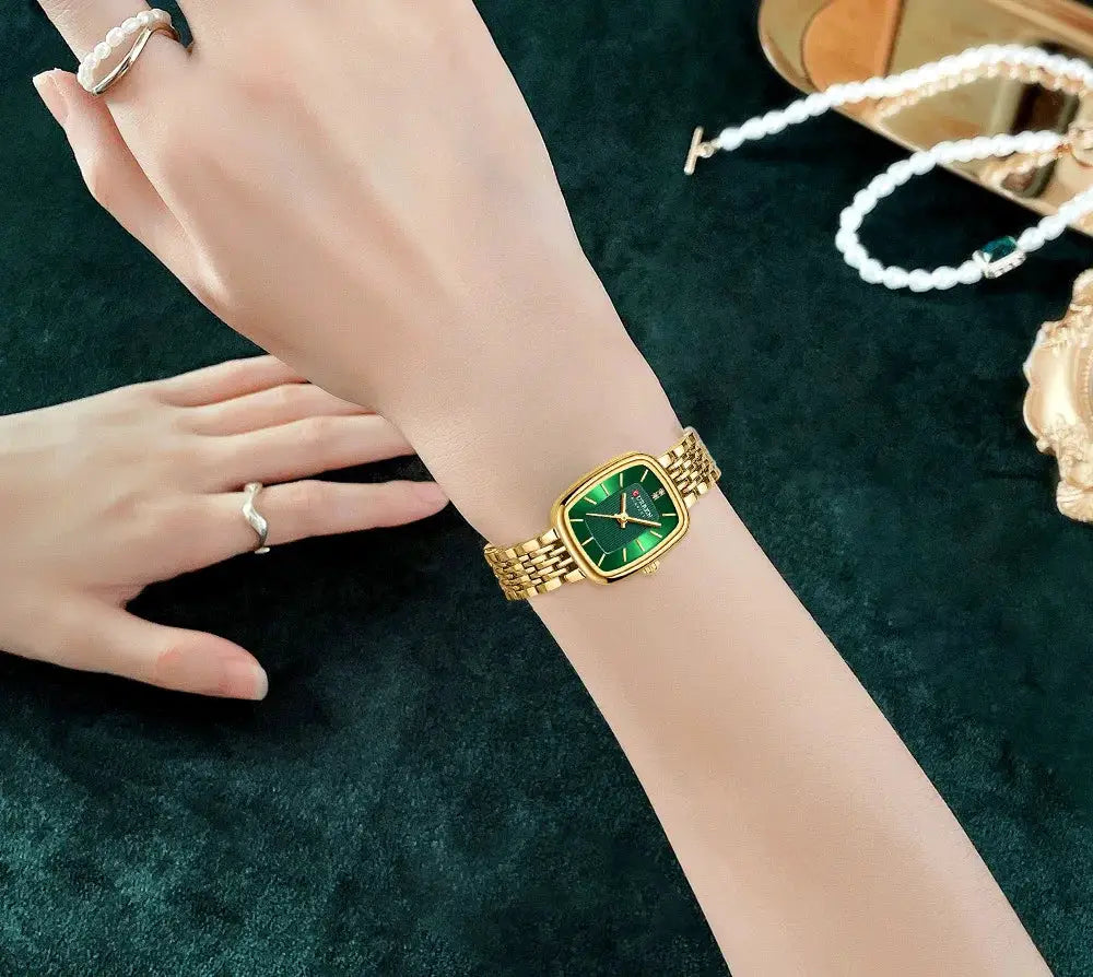 CURRN 9093 women's quartz watch with green dial and gold-tone stainless steel band