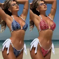 Bikini set by Simples Market, 2026 mesh neck-lace-up; blue and red two-piece swimsuits shown side by side.