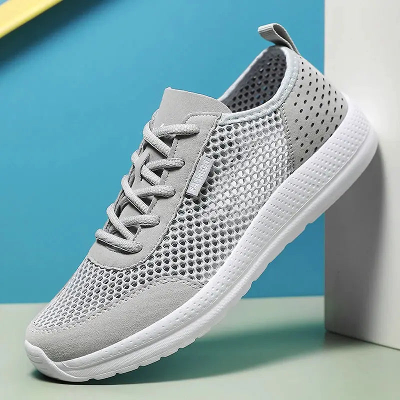 Men's breathable mesh sport shoes, gray with white sole; lightweight running sneakers.
