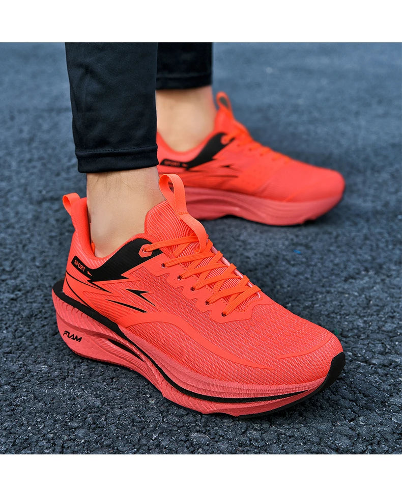 Men's orange running shoes, pair, with breathable mesh upper and black accents