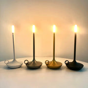 Atmosphere LED candle USB desk lamp set of 5 in white, black, gold, bronze and gunmetal on round bases.