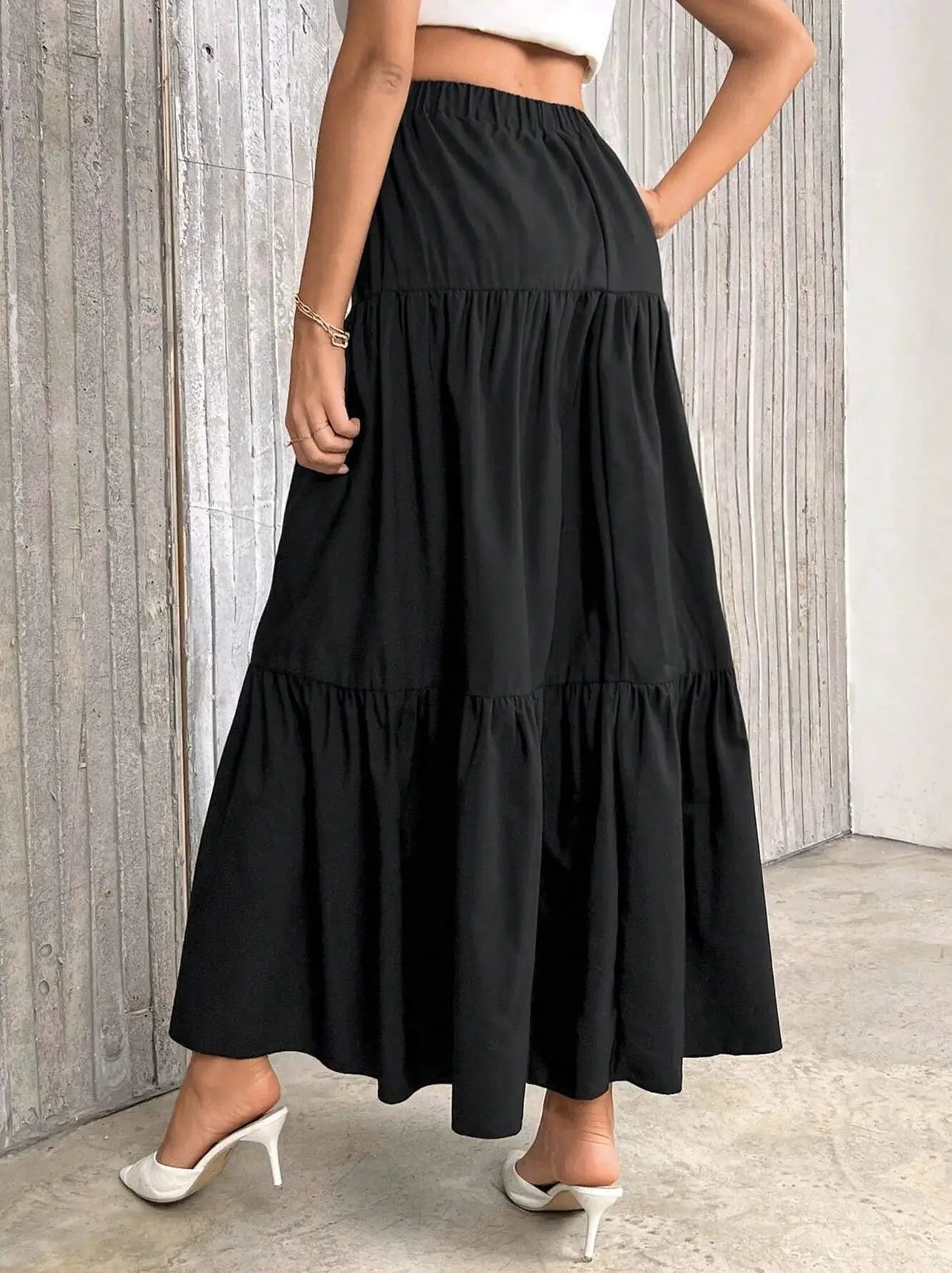 Women's black flounce-hem tiered long skirt with elastic high waist