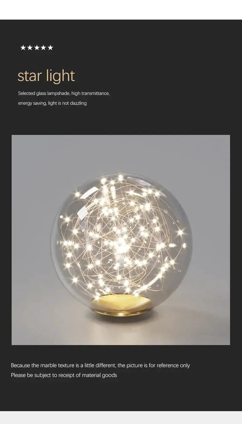 Nordic glass globe chandelier with gold base and tangled string lights for living room decor.