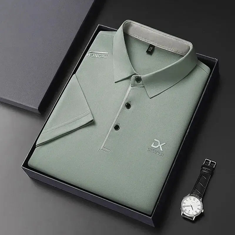 Men's sage green polo shirt with DX badge logo and Hongat patch; breathable, versatile business casual top in box.