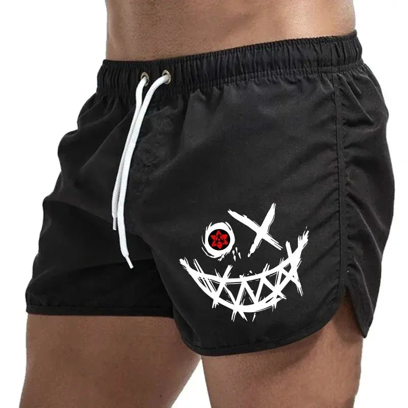 Men's black board shorts with white graphic smiley face print and drawstring