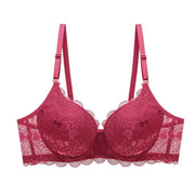 Pink lace push-up bra with underwire and adjustable straps