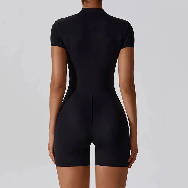 Women's black yoga jumpsuit with short sleeves, snug fit