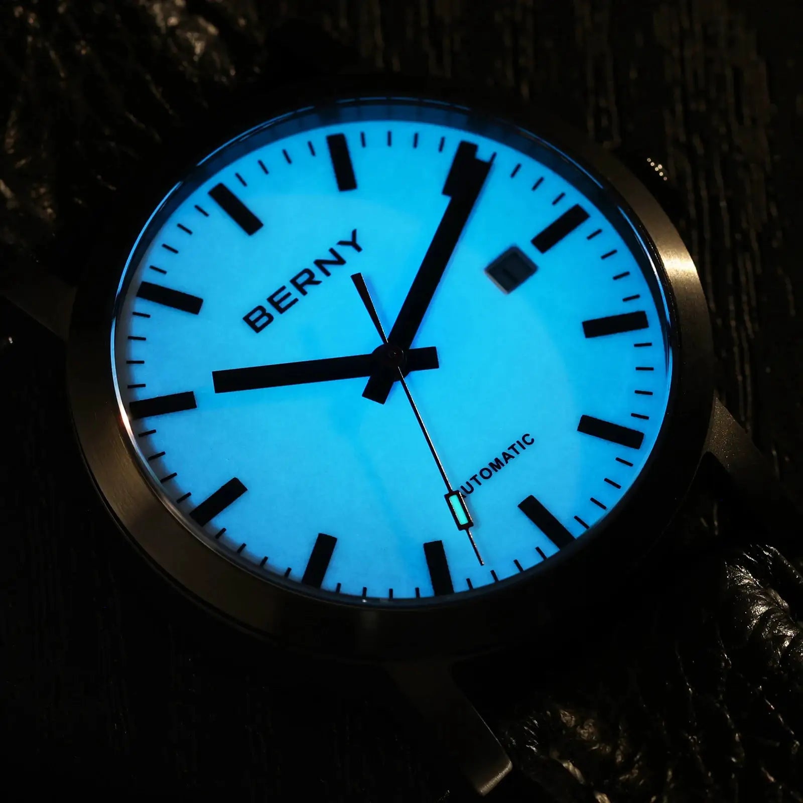BERNY men's automatic wristwatch with blue luminous dial and bold black hour markers