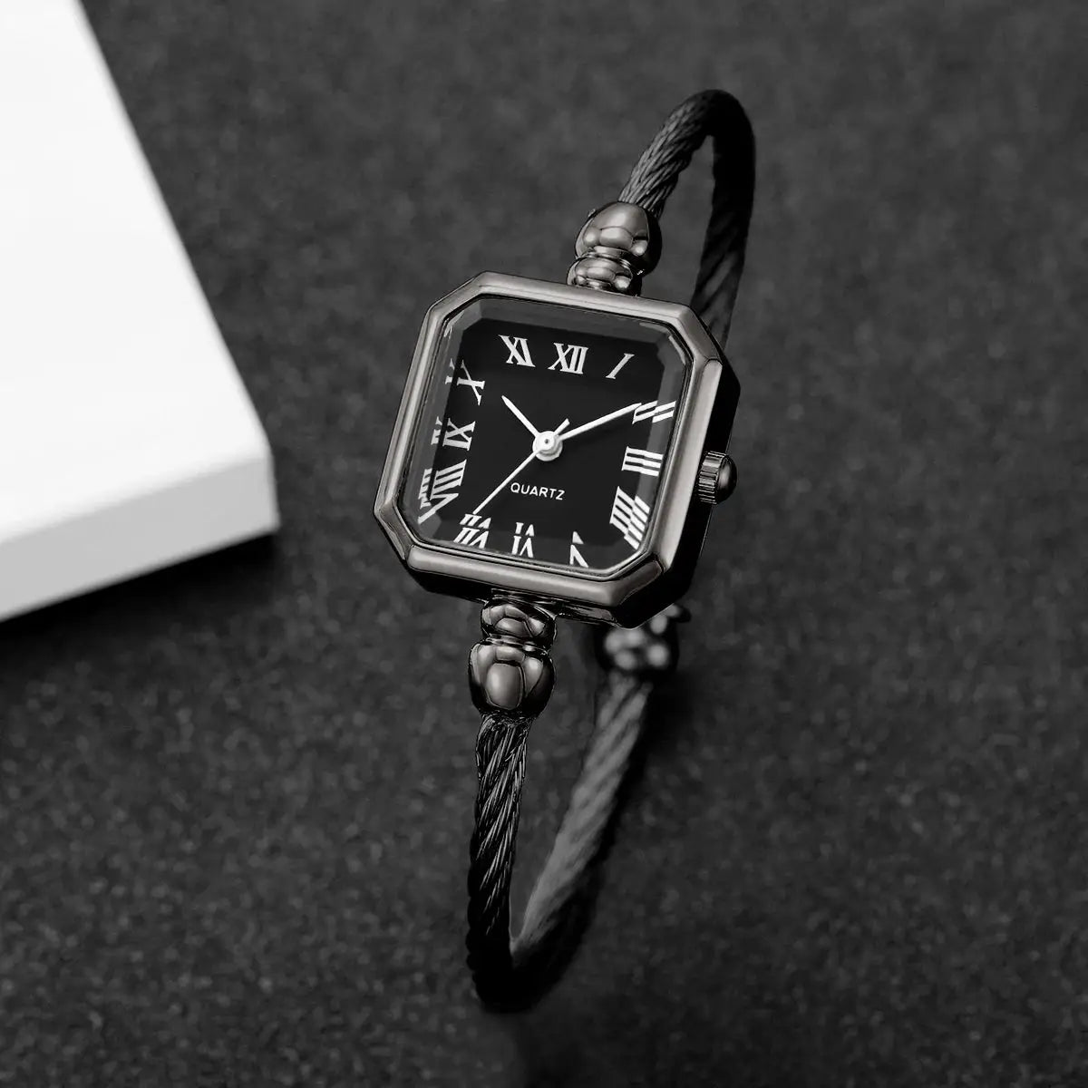 Women's square Roma-dial quartz watch with black braided bracelet strap