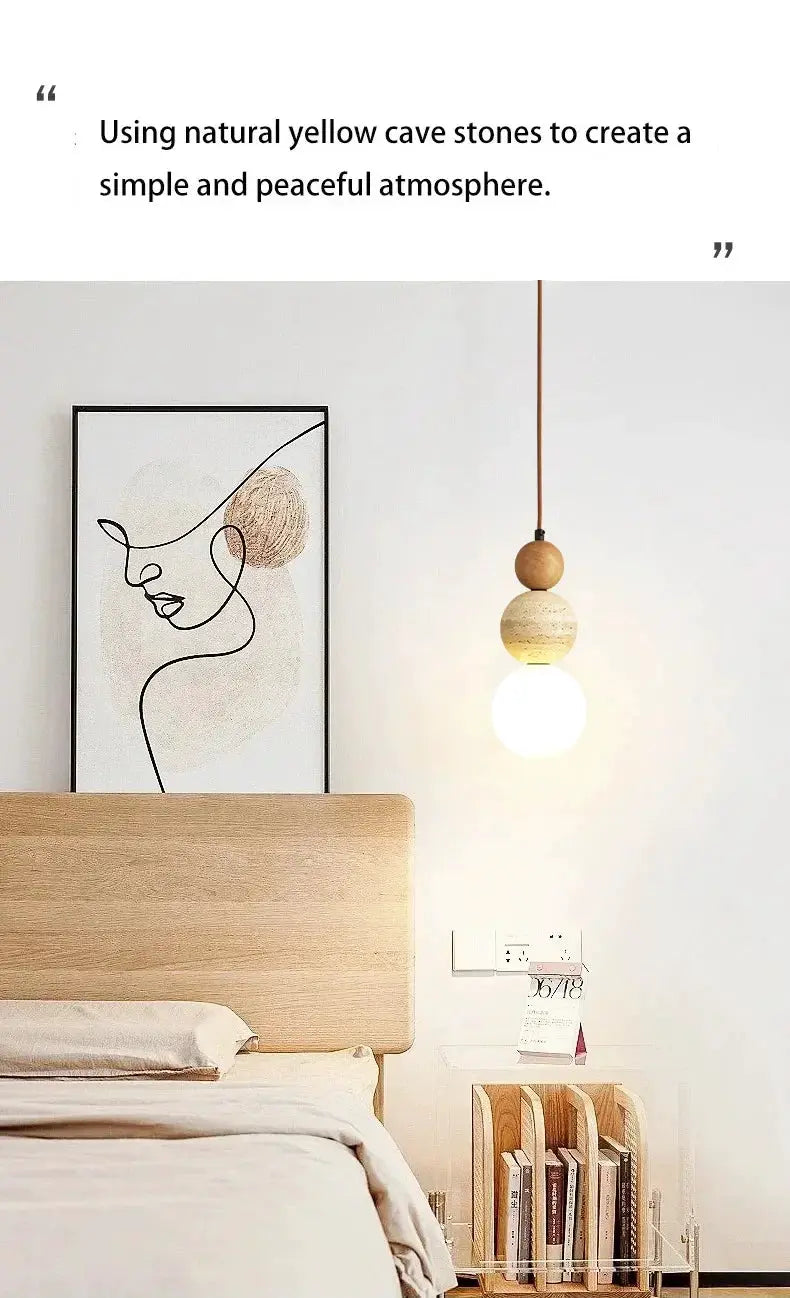 Pendant lamp featuring cream stone and wood beads for bedside in a modern bedroom by Simples Market.