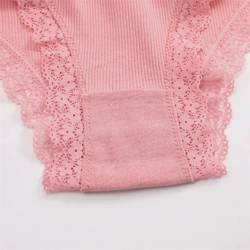 Women's pink cotton briefs with lace trim and soft knit fabric