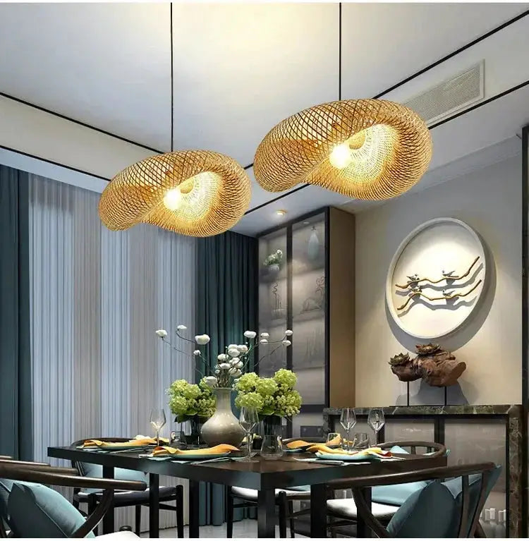Pair of handmade bamboo-weaving LED pendant lights hanging over a dining table in a modern living room