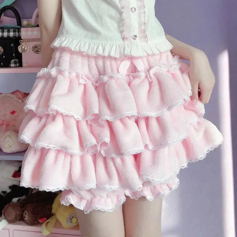 Lolita-style pink layered ruffle skirt with white lace trim