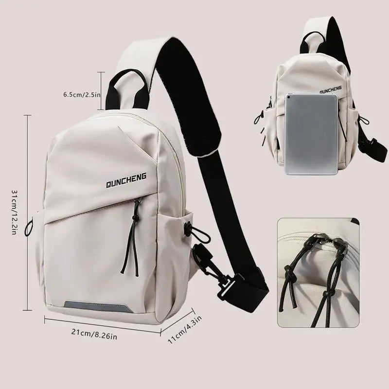 Lightweight crossbody tablet bag dimensions and design shown with a tablet secured in the back pocket.