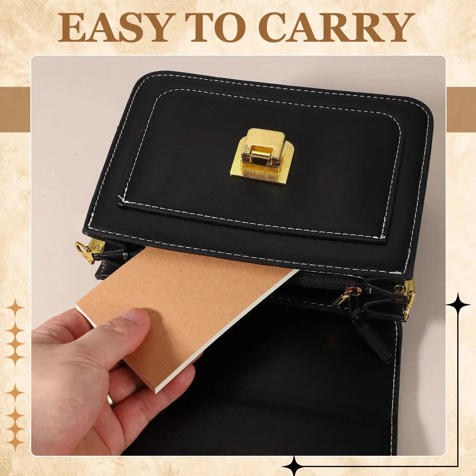 Black leather planner with white stitching and gold clasp, hand inserting a brown pocket notepad