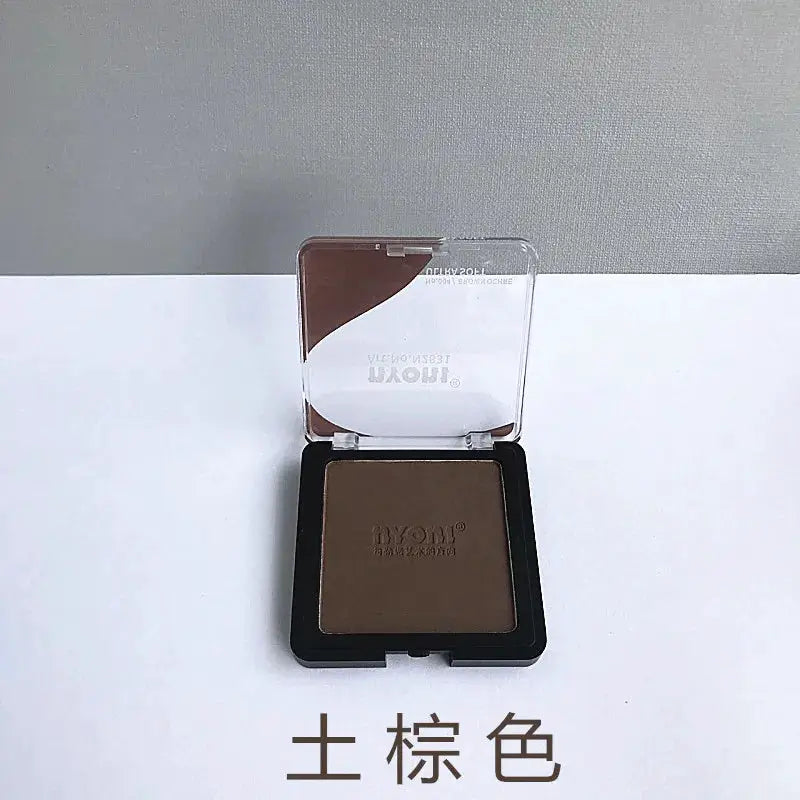 Simples Market pressed brown powder compact with clear lid, earth brown shade
