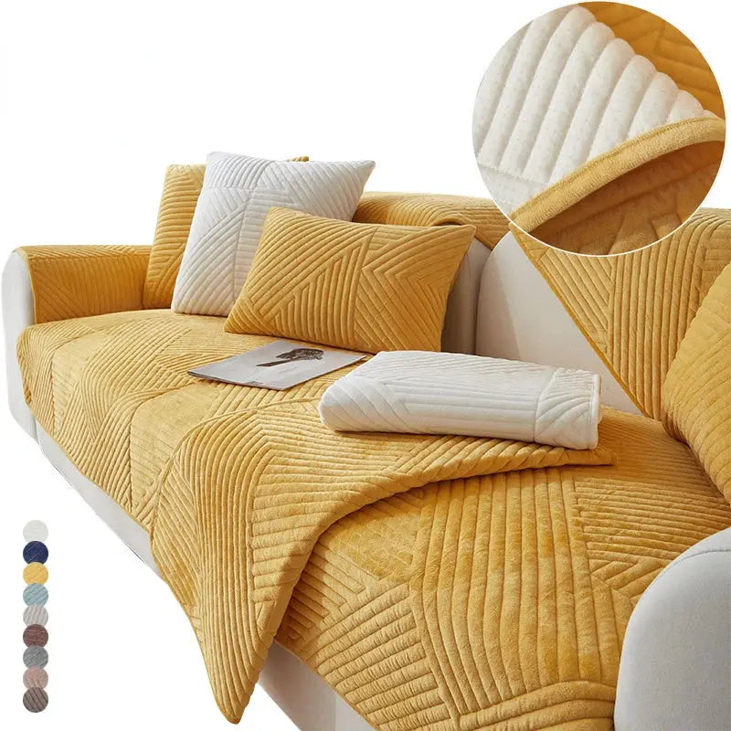Crystal Velvet sofa cover by Simples Market in mustard yellow with a quilted geometric pattern.