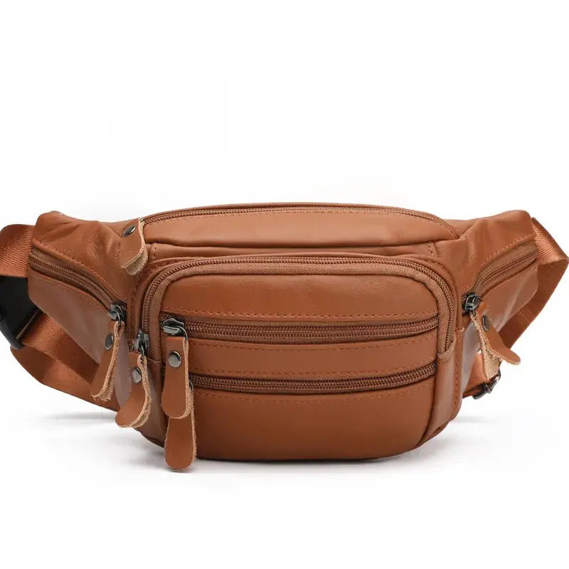 Leather fanny pack in brown with multiple zip pockets and an adjustable waist strap.