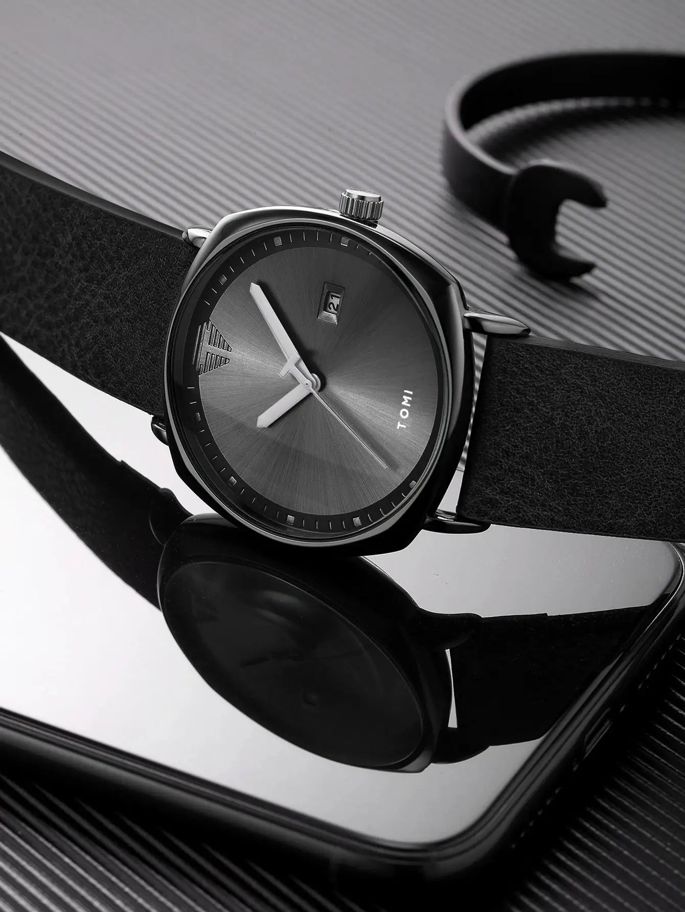 TOMI men's minimalist watch with black dial, calendar date window, leather strap