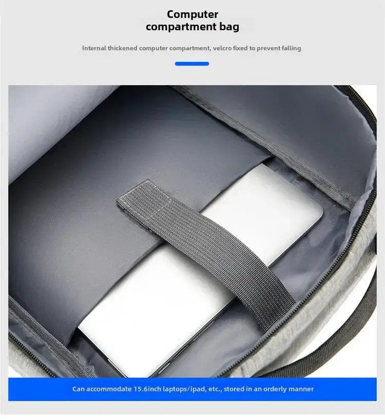 Backpack with internal padded laptop compartment and Velcro strap securing a 15.6-inch laptop