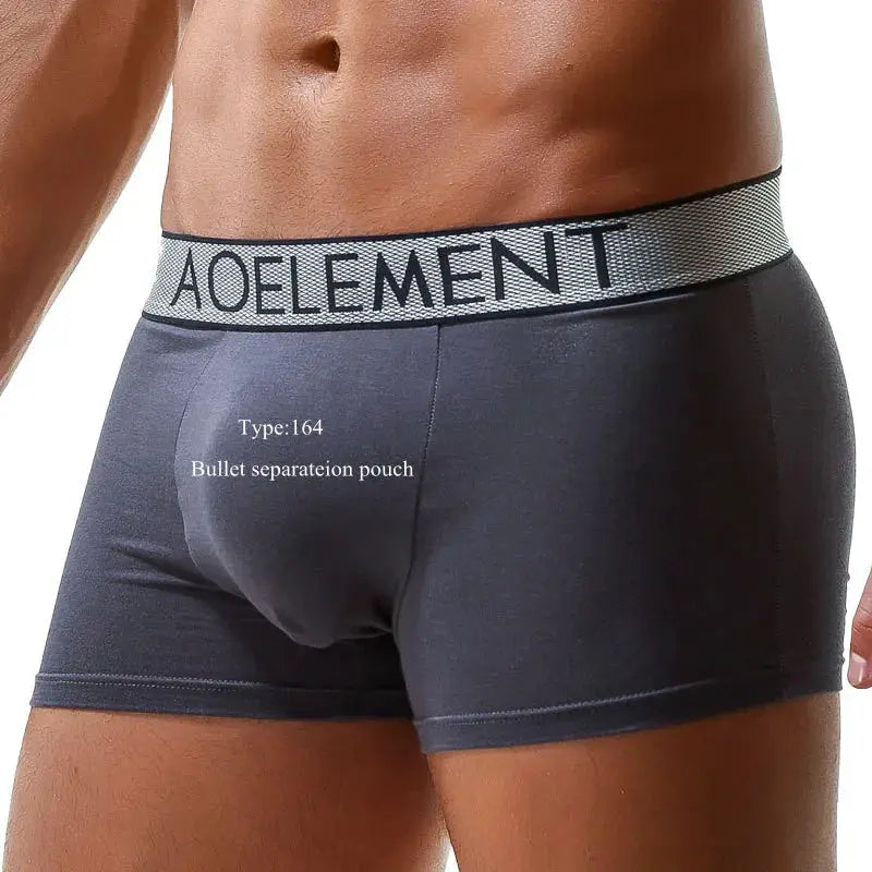 Men's boxer briefs in dark navy with gray elastic waistband and bullet-separation pouch design
