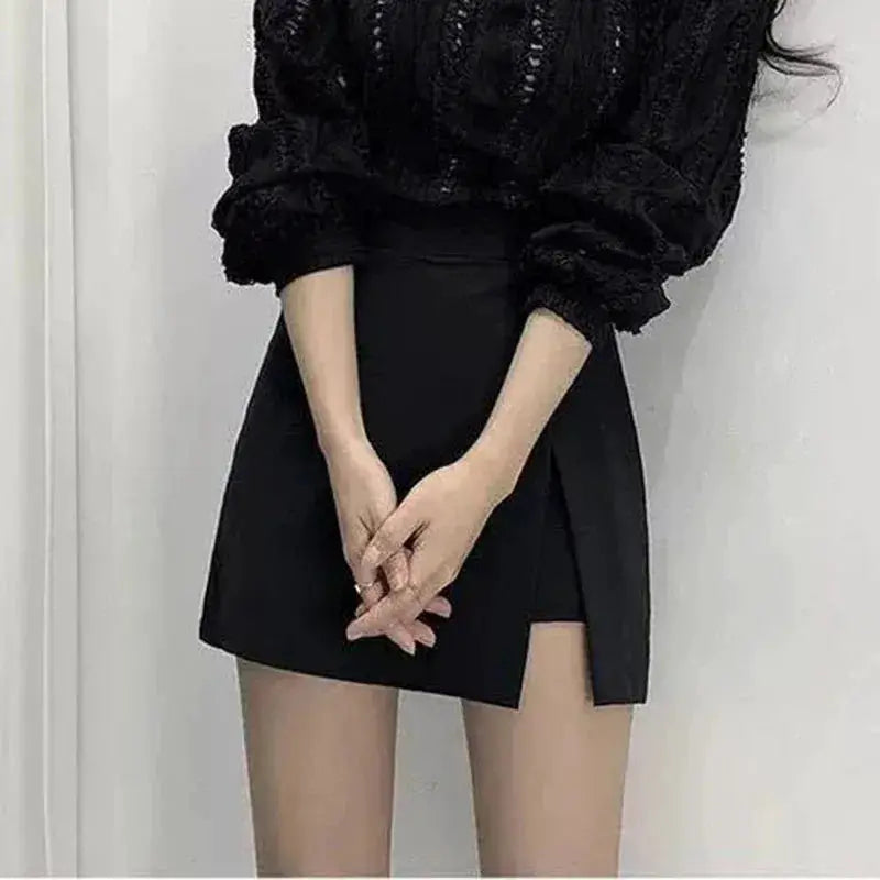Black wrap mini skirt for women, high-waist A-line with side slit.