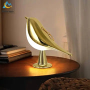 Magpie-shaped LED desk lamp, gold finish, touch-controlled decorative bird light
