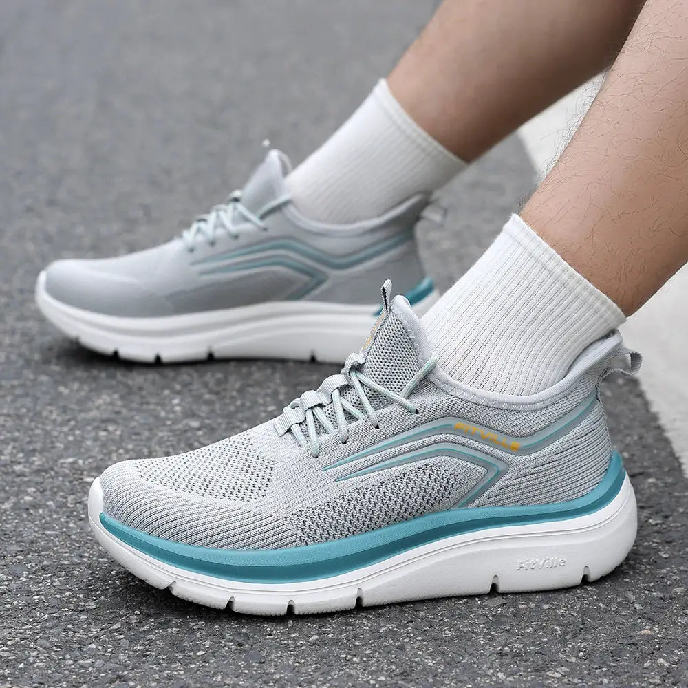 FitVille men's running shoes pair with light gray mesh upper, teal side accents, and thick white sole.