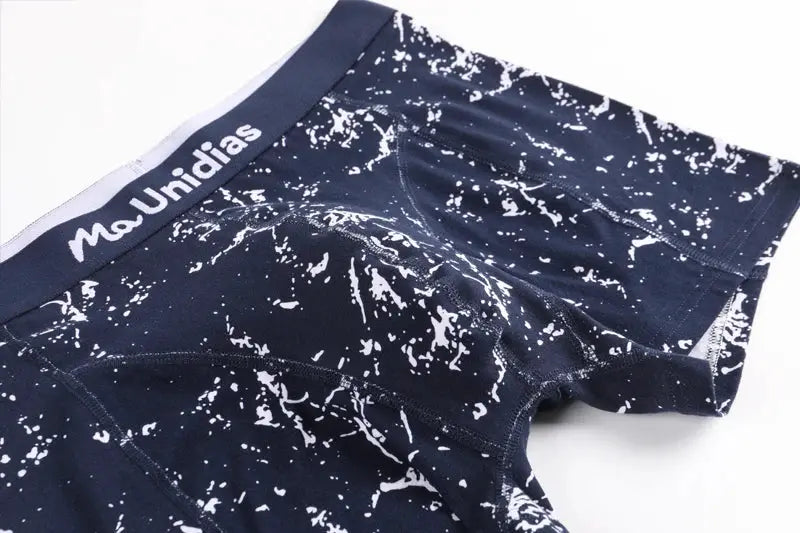 Cotton print men's boxers, navy blue with white marble pattern and elastic waistband.