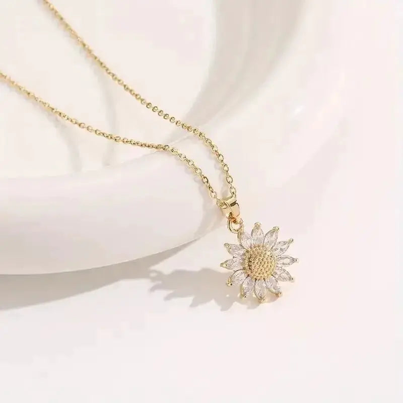 Sunflower pendant necklace by Simples Market with gold-tone chain and crystal petals