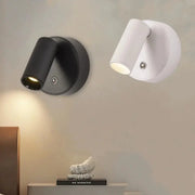Rechargeable LED wall lamp pair with swiveling cylindrical spotlights; black and white versions shown.