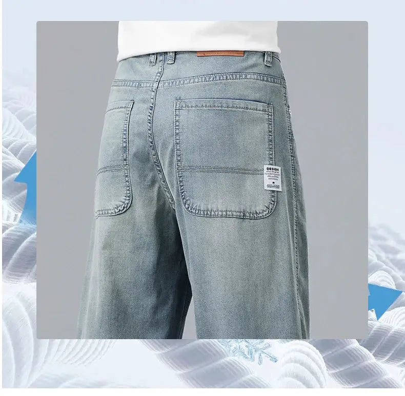 Men's light blue denim jeans with back patch pockets, loose straight fit