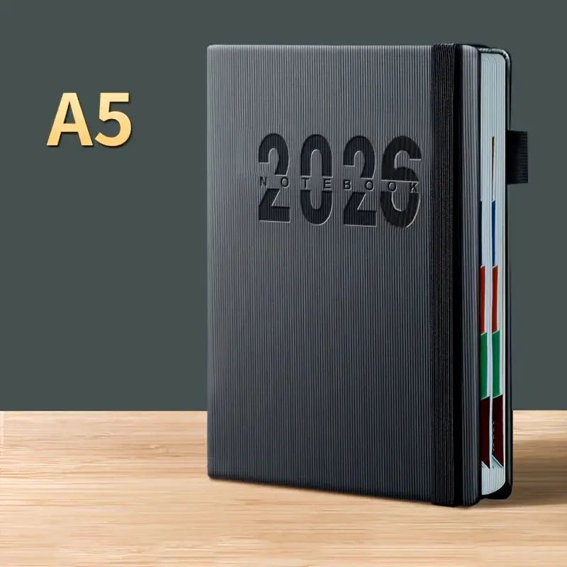 A5 black textured calendar planner with 2026 embossed cover, 400 pages and color-coded daily plan tabs