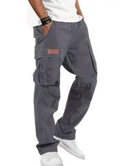 Simples Market men's cargo workwear pants in dark gray with multiple pockets and a loose straight-leg fit