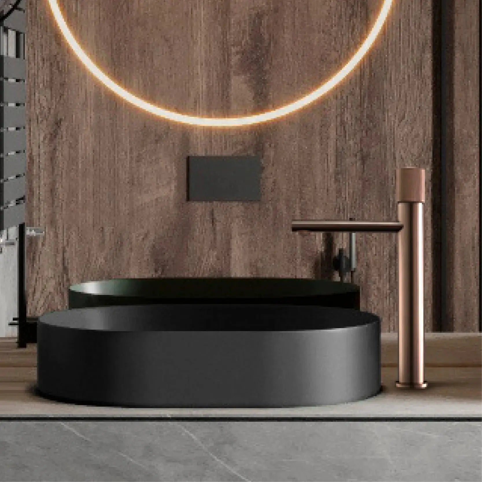 Brass-black bathroom faucet set with a tall cylindrical faucet beside a black round sink