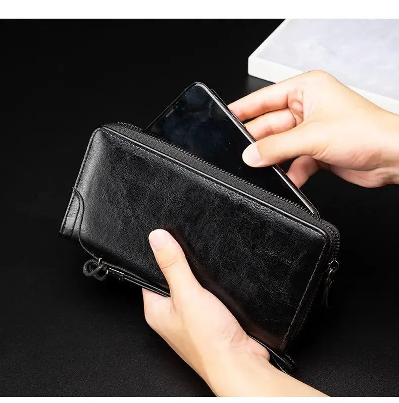 Men's black PU leather long zipper wallet; sleek business clutch for cards and cash