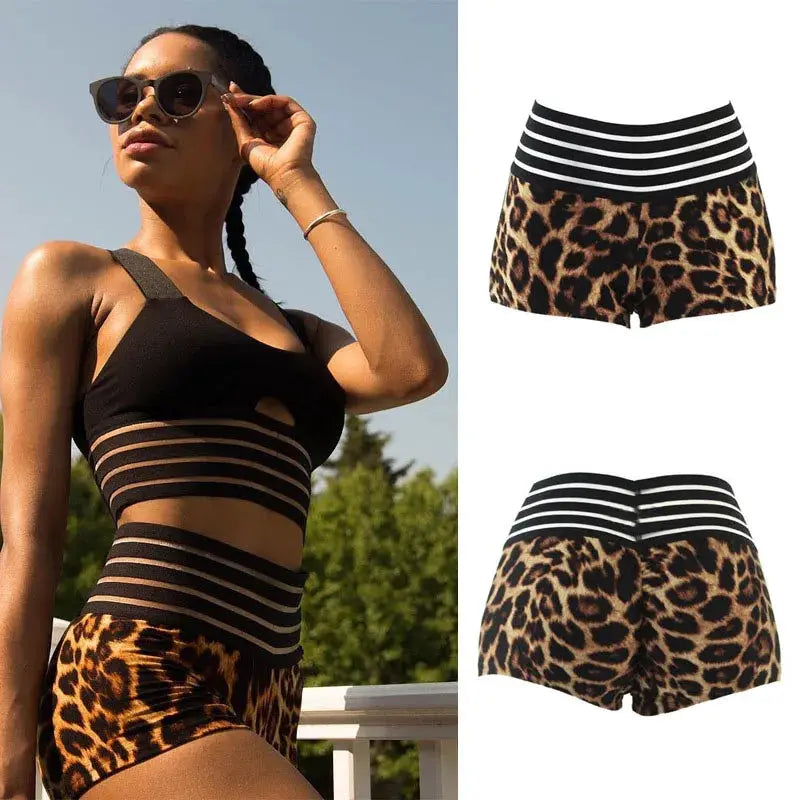 Leopard print high-waist sports shorts with black striped waistband; front and back views