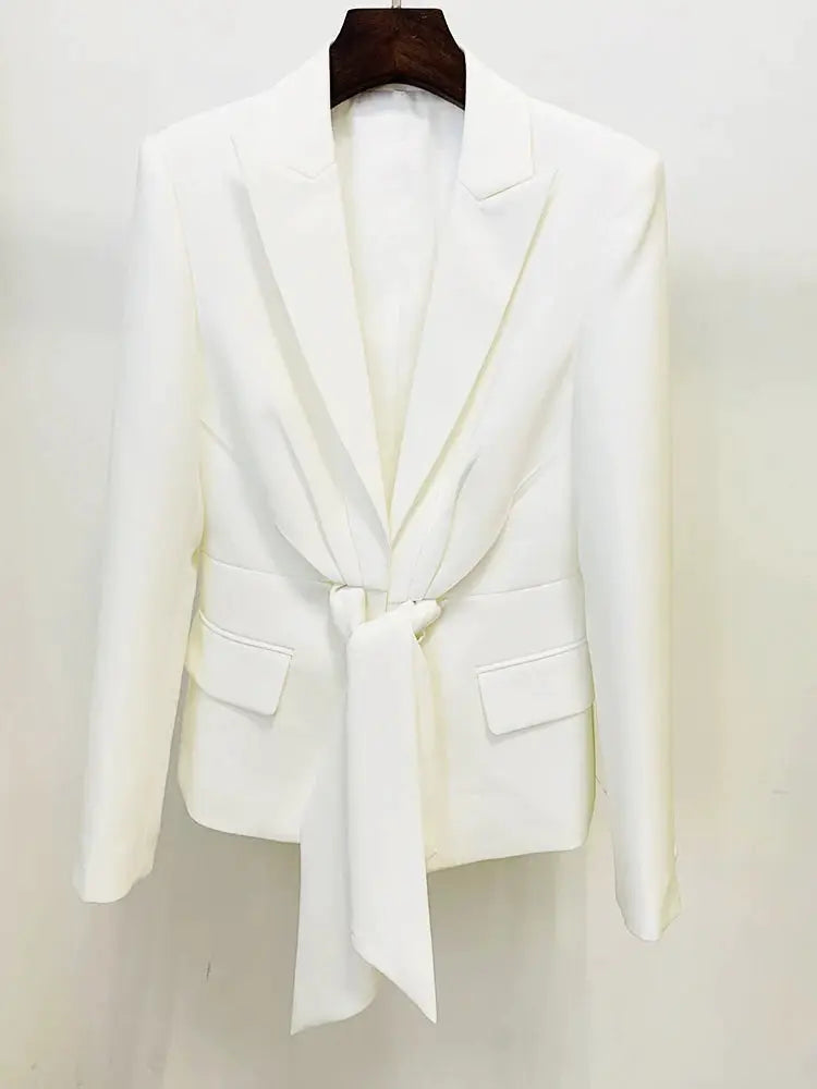 White blazer with waist tie belt and front flap pockets on hanger